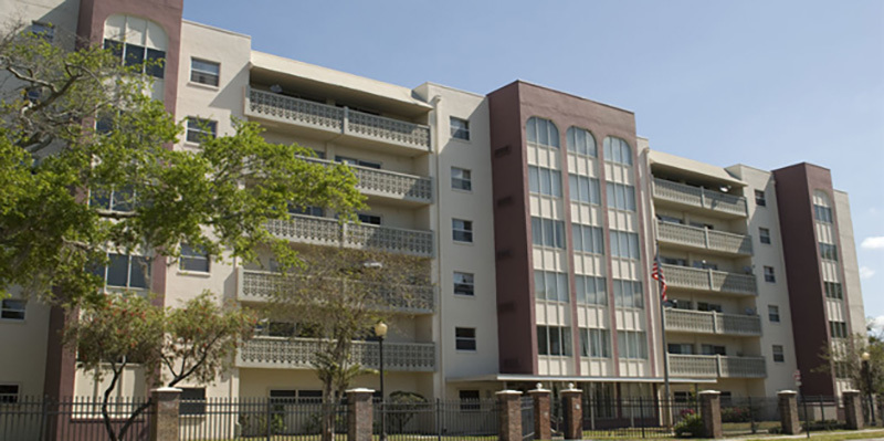 A multi-story Lorna Doone Apartments building with balconies.